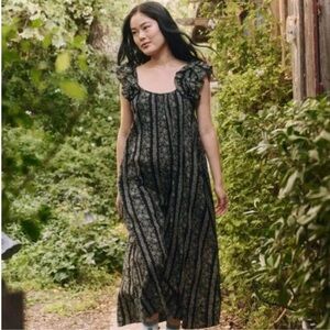 THE GREAT. The Cascade Dress. Black and Cream, Floral Ruffle-Strap Maxi Dress.